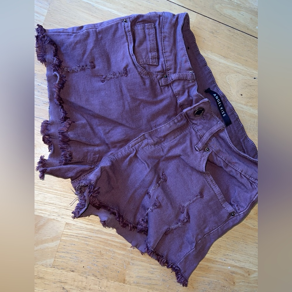 Off color red/maroonish shorts. Size 3.